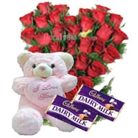 » Recommend this product Red Roses with Cadbury Dairy Milk and Teddy Bear